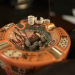 Finished Plasencia Reserva Original bands displayed on an Arturo Fuente ashtray beside the nub after completing the review.