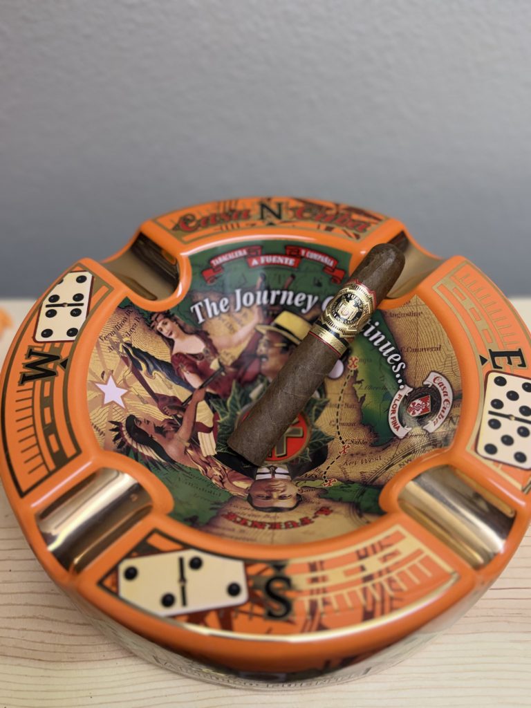 Arturo Fuente Reserva Don Carlos Robusto resting on a Casa Cuba ashtray before being lit.