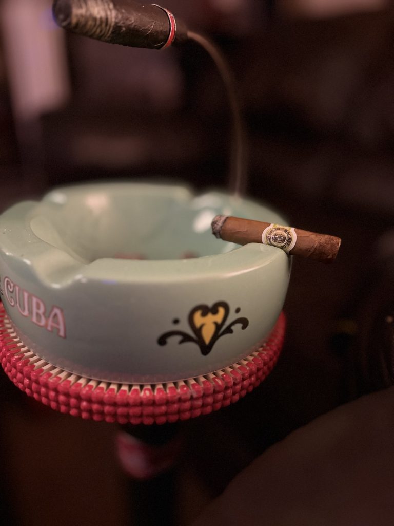 Macanudo Café Prince Philip Churchill late in the smoke resting on an ashtray.