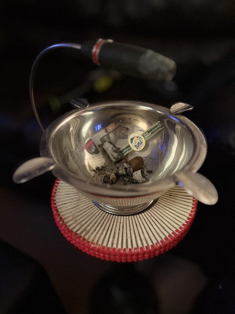 Finished Lure Tally Allie Habano Toro nub and removed Lure Cigars band inside a metal ashtray.