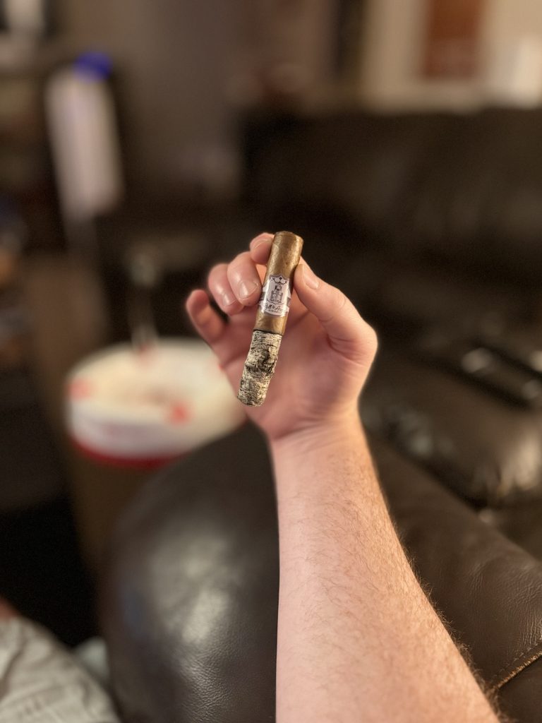 Stolen Throne Call to Arms Robusto with long textured ash during the later portion of the smoke.